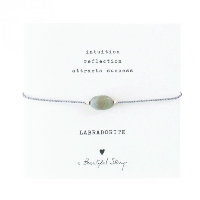 A Beautiful Story, Unlock your strength and sparkle with this beautiful Gemstone Card Labradorite Silver Bracelet! Crafted with a cotton thread and a Labradorite gemstone, this adjustable bracelet will help you become the best version of yourself.