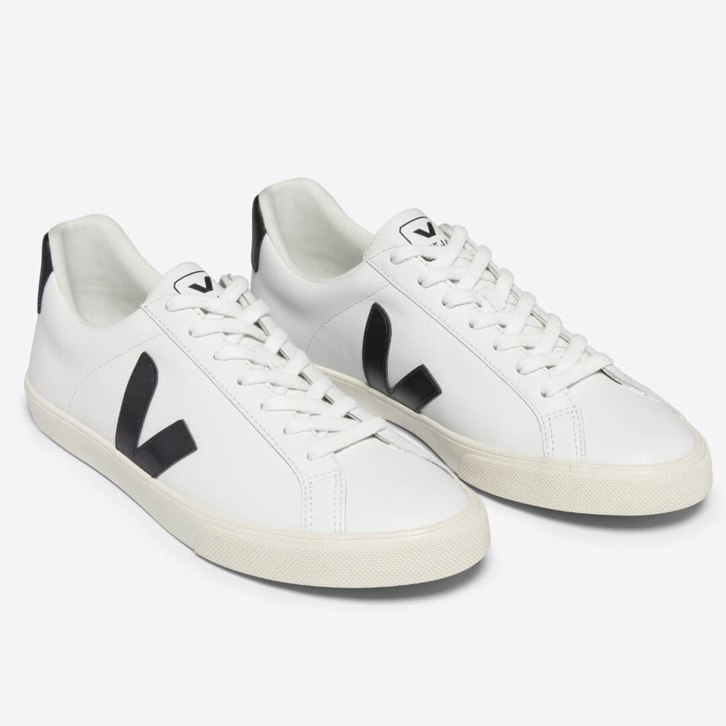 Veja Esplar Leather Extra White Black Trainers are crafted with your comfort in mind, these trainers feature a luxurious leather upper combined with suede panels and logo V for a sleek, modern look. All materials are eco-friendly and responsibly sourced. Fast UK delivery from an independent boutique