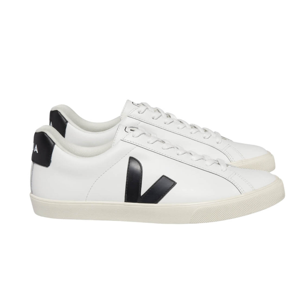Veja Esplar Leather Extra White Black Trainers are crafted with your comfort in mind, these trainers feature a luxurious leather upper combined with suede panels and logo V for a sleek, modern look. All materials are eco-friendly and responsibly sourced. Fast UK delivery from an independent boutique