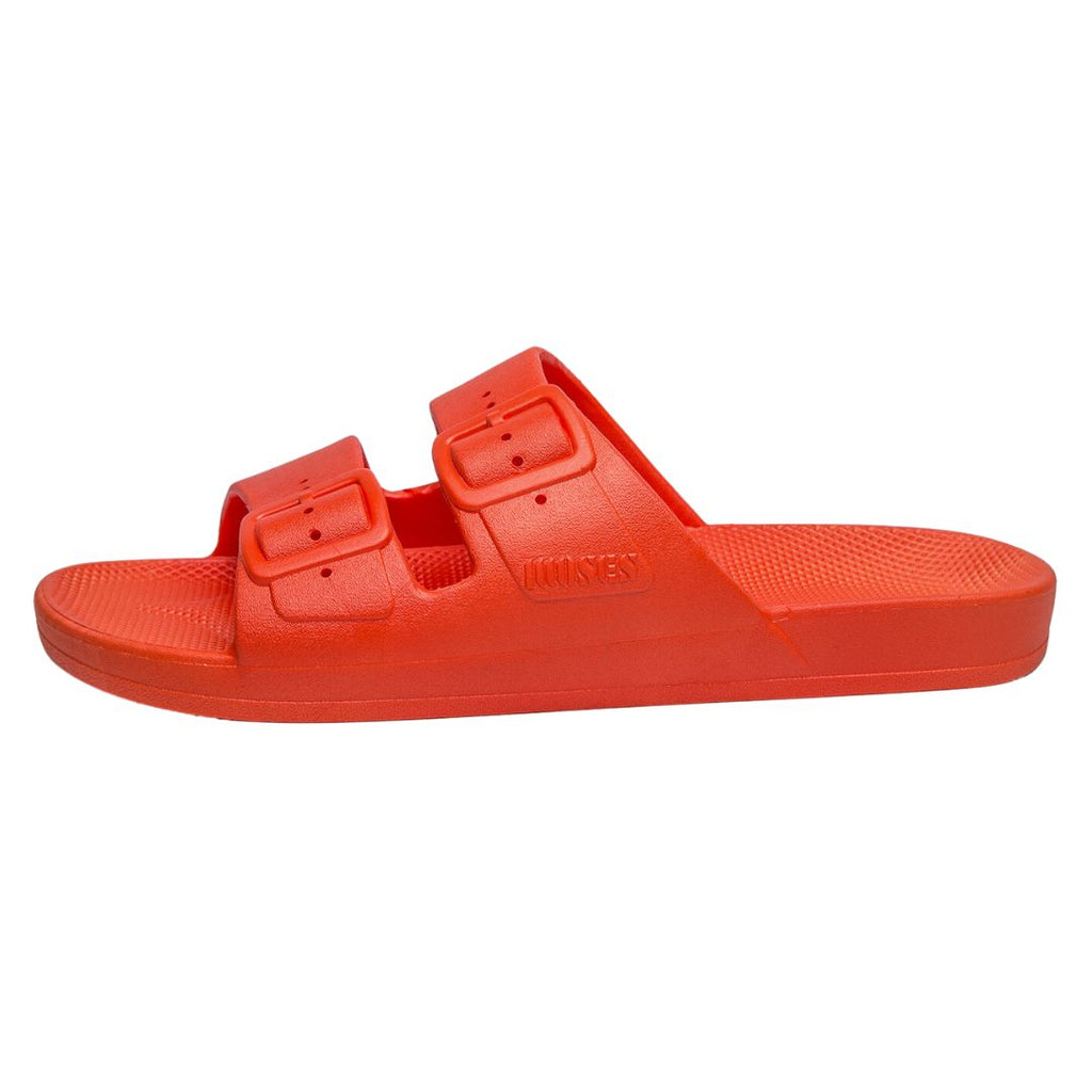Freedom Moses Lucy Orange Neon Slides! Featuring a flexible PVC with great grip and anti-slip sole for maximum control, plus the ultimate footbed for unbeatable comfort and support.